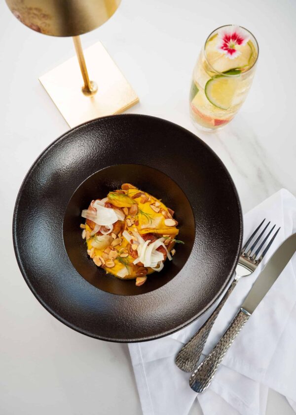 Alder wood smoked seared scallops served with carrot purée, toasted almonds, dill, heirloom carrots, and warm confit fennel, elegantly plated in a fine dining presentation